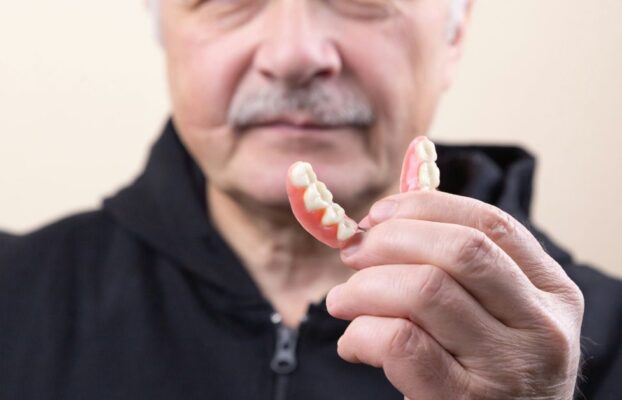 Why Do New Dentures Feel Strange at First?